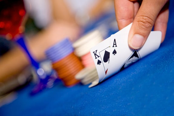 playing cards during a blackjack game with a good hand
